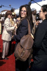 Bullock at the 1996 Spirits. She must have changed clothes because she wore something more light and formal for the event.
